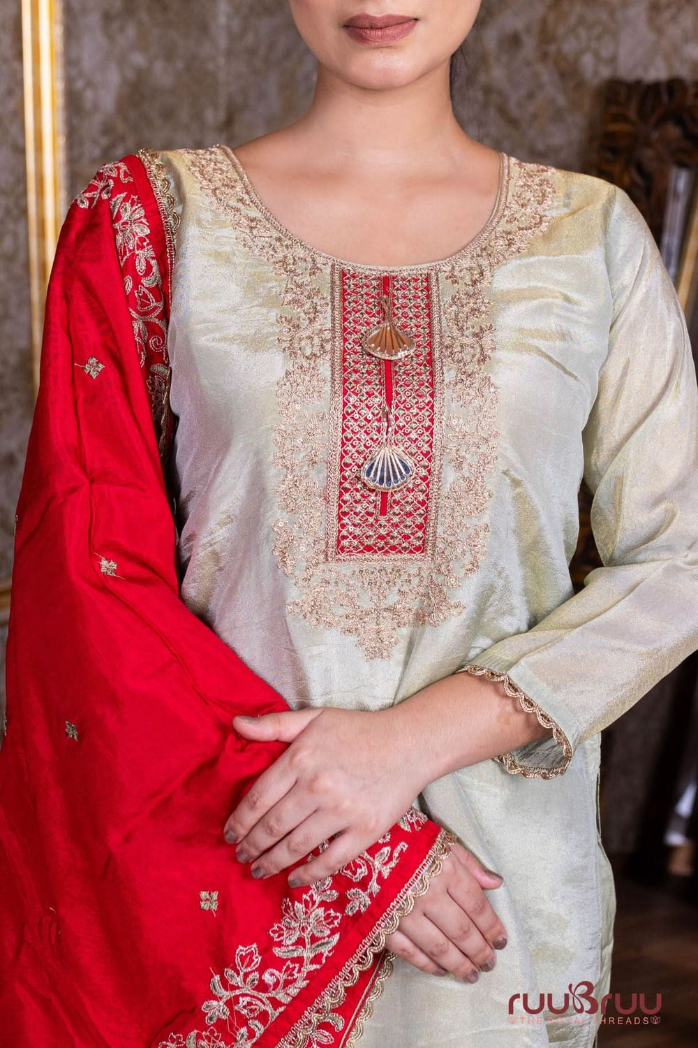 Pure Silk Shimmer Ladies Suit with Premium Zari Embroidery.