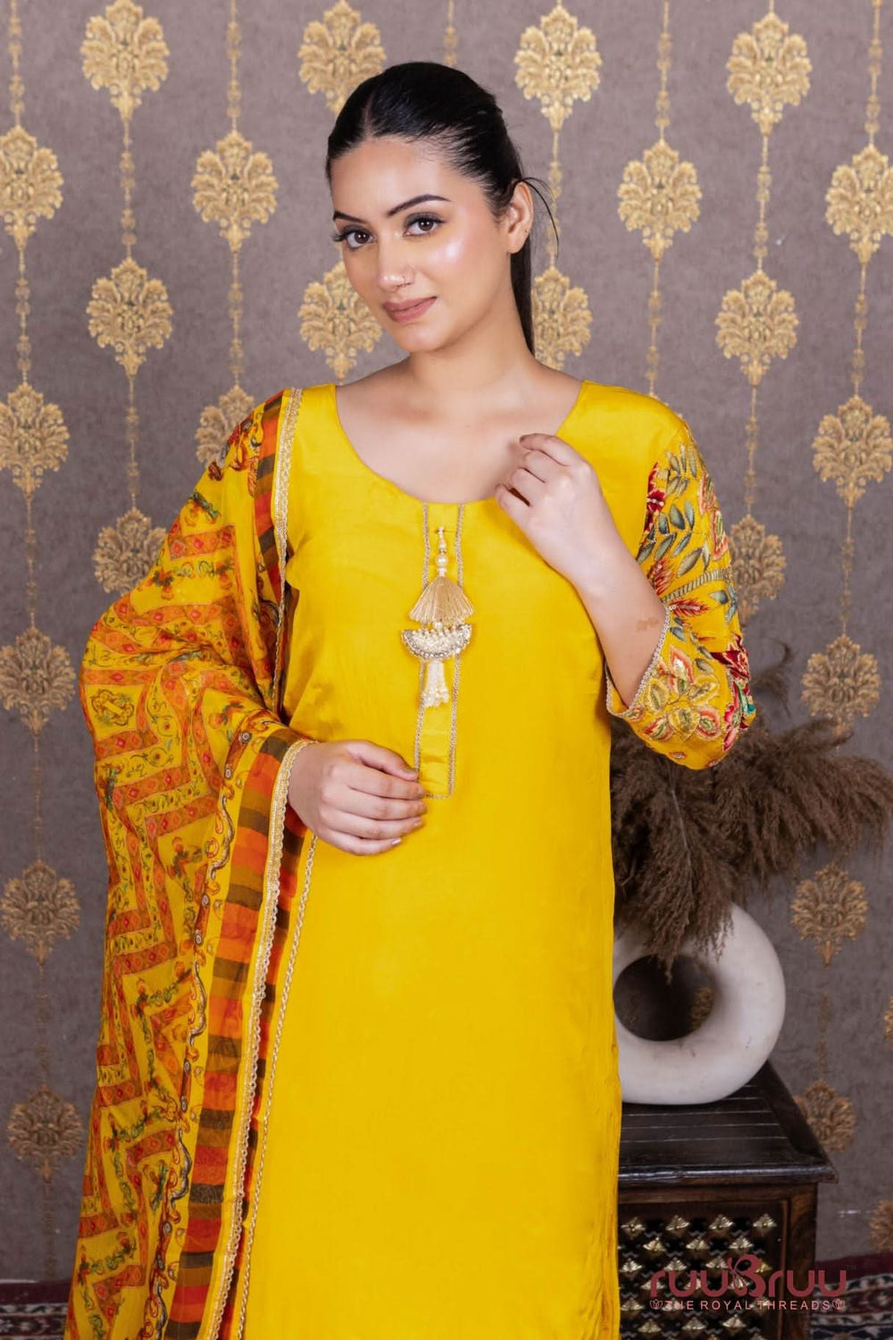 Pure Silk Shimmer Ladies Suit with Heavy Embroidered Sleeves.