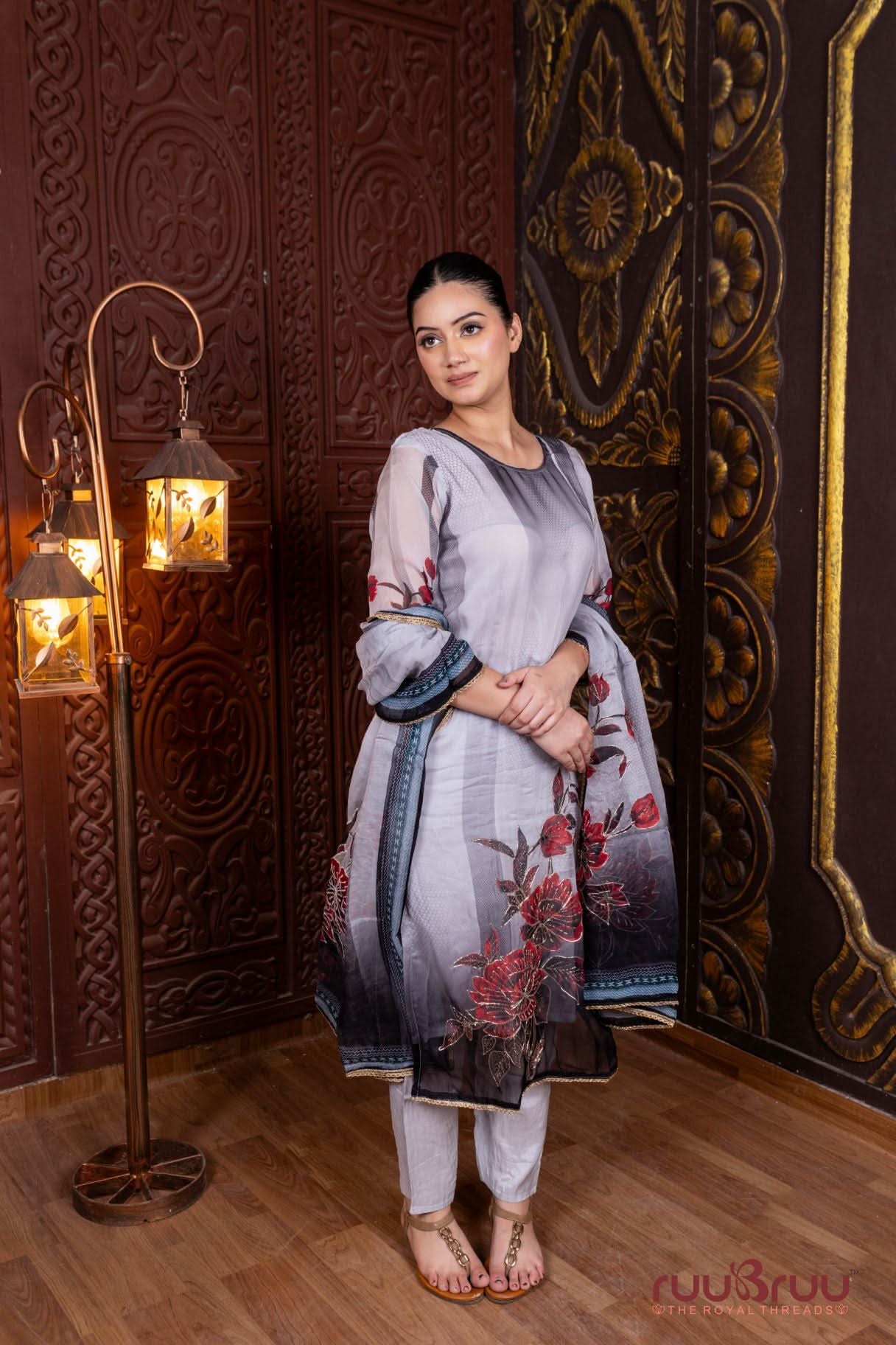 Pure Viscose Organza Ladies Suit with Digital Print & Zari Embroidery.