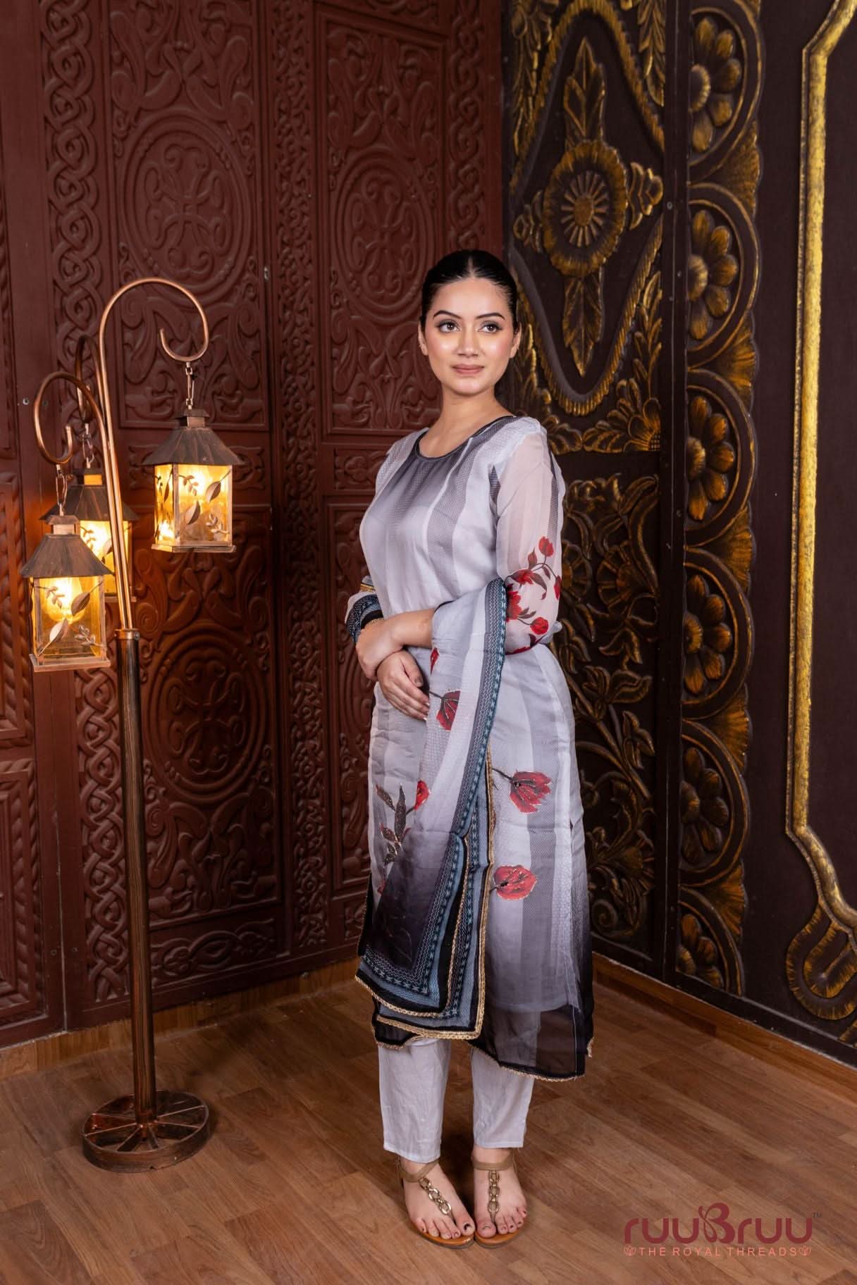 Pure Viscose Organza Ladies Suit with Digital Print & Zari Embroidery.