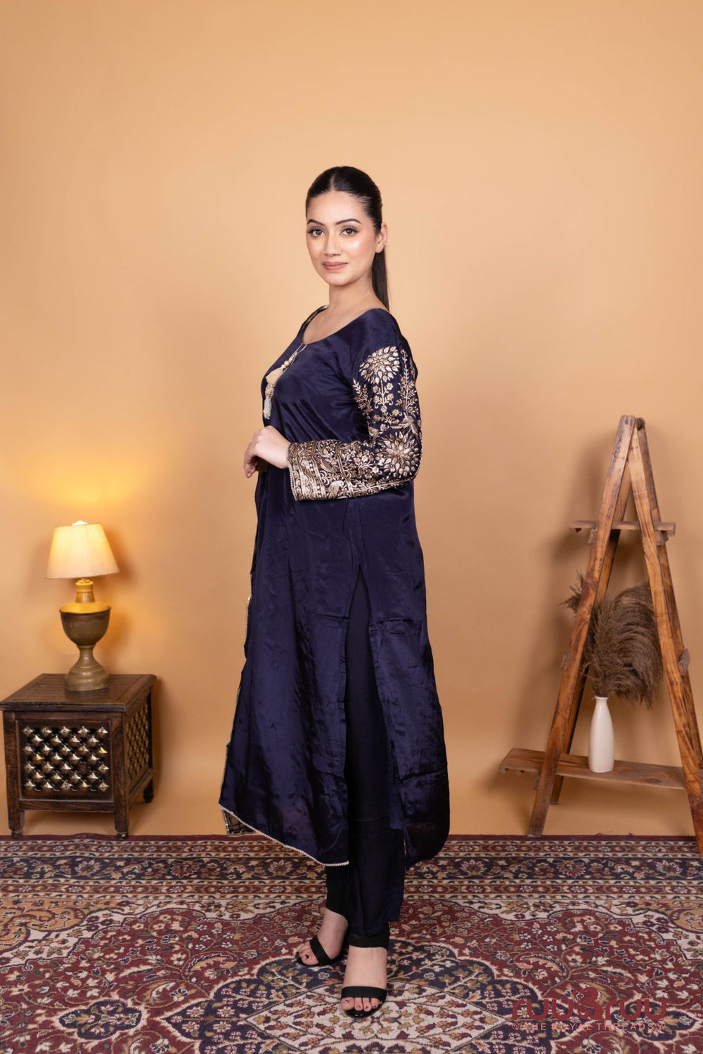 Pure Viscose Silk Crepe Ladies Suit with Heavy Embroidery on Sleeves.