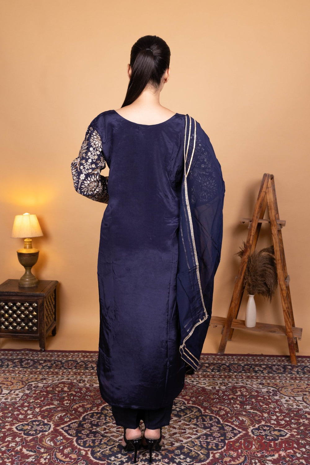 Pure Viscose Silk Crepe Ladies Suit with Heavy Embroidery on Sleeves.