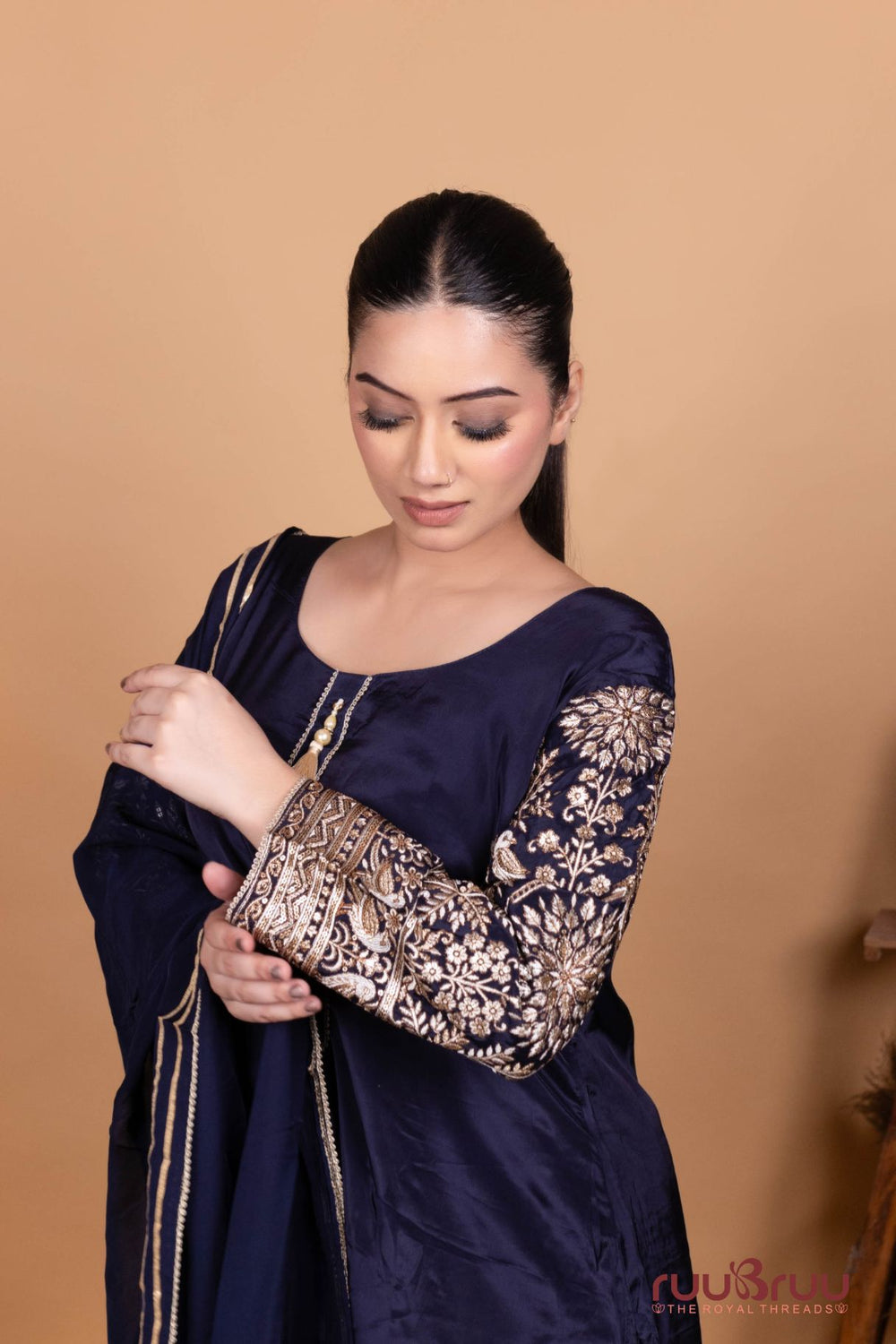 Pure Viscose Silk Crepe Ladies Suit with Heavy Embroidery on Sleeves.