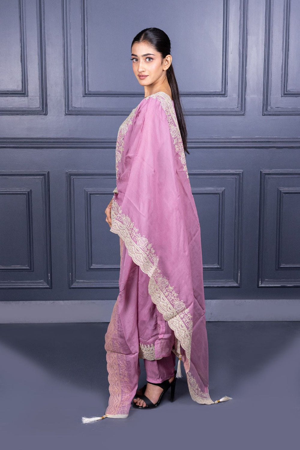 Pure Viscose Silk Ladies Suit with Heavy Embroidery on Suit & Dupatta with Tassels.
