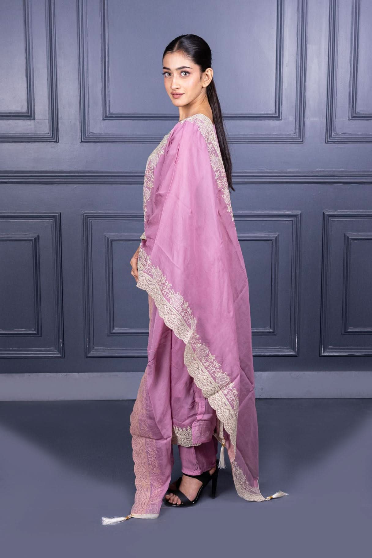 Pure Viscose Silk Ladies Suit with Heavy Embroidery on Suit & Dupatta with Tassels.
