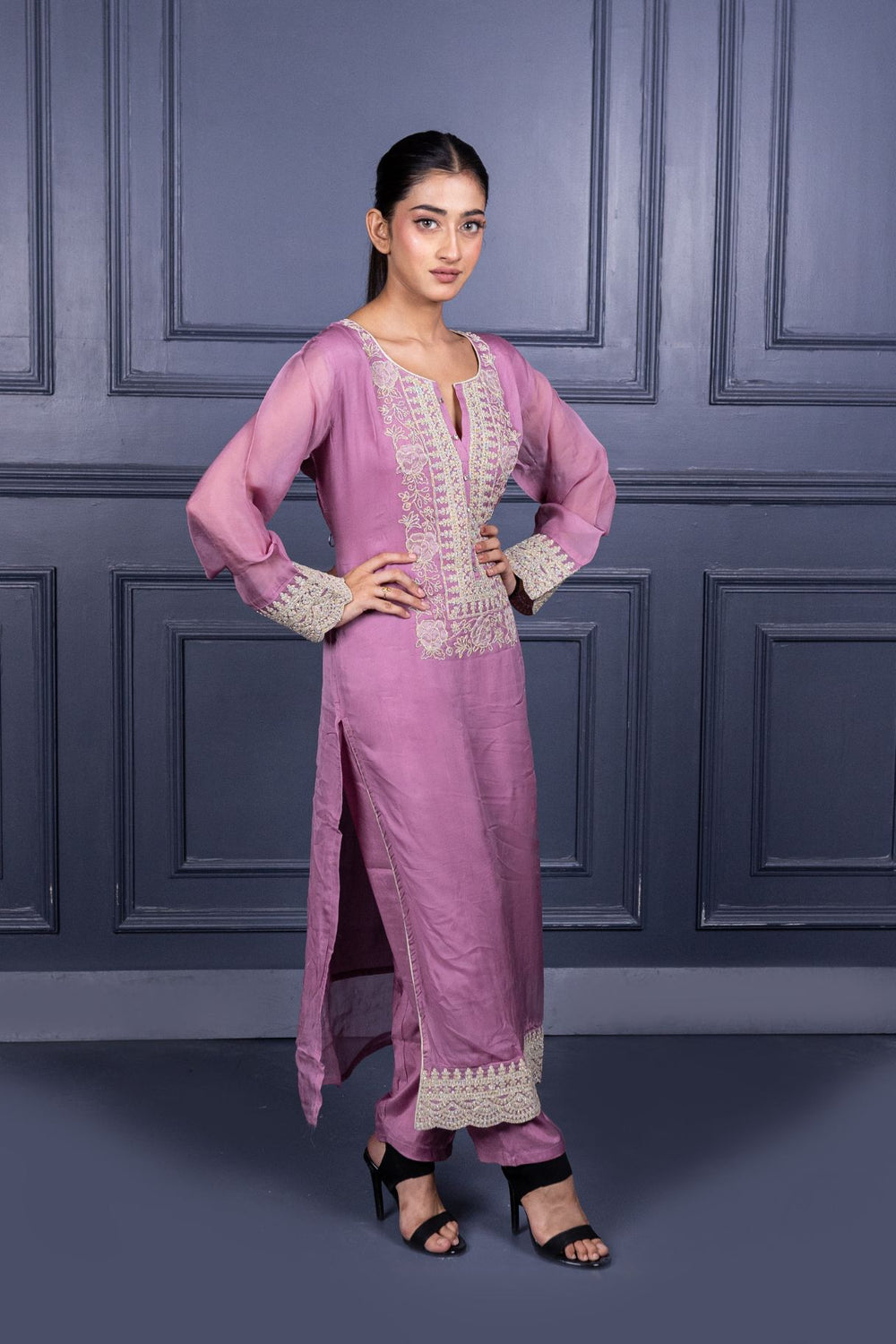 Pure Viscose Silk Ladies Suit with Heavy Embroidery on Suit & Dupatta with Tassels.