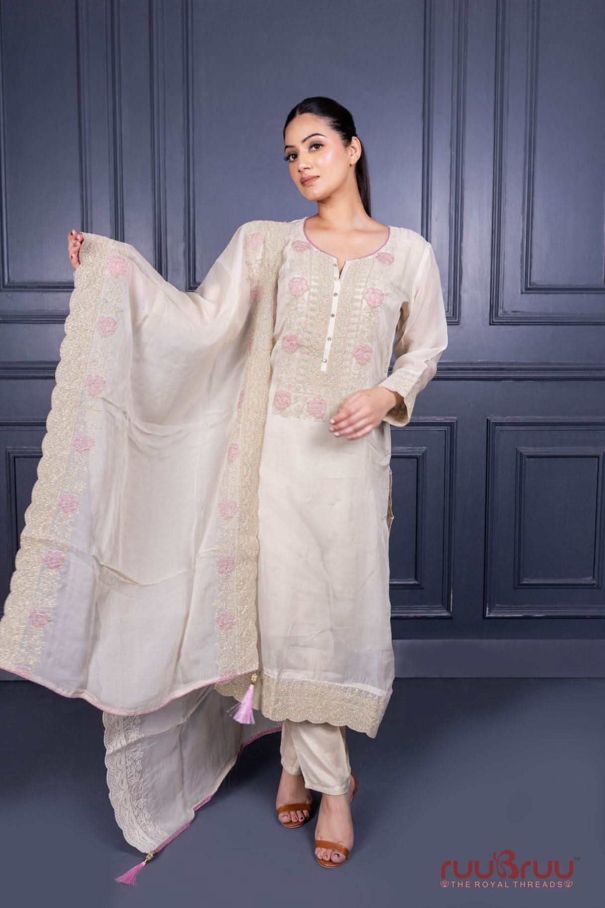 Pure Viscose Silk Ladies Suit with Heavy Embroidery on Suit & Dupatta with Tassels.