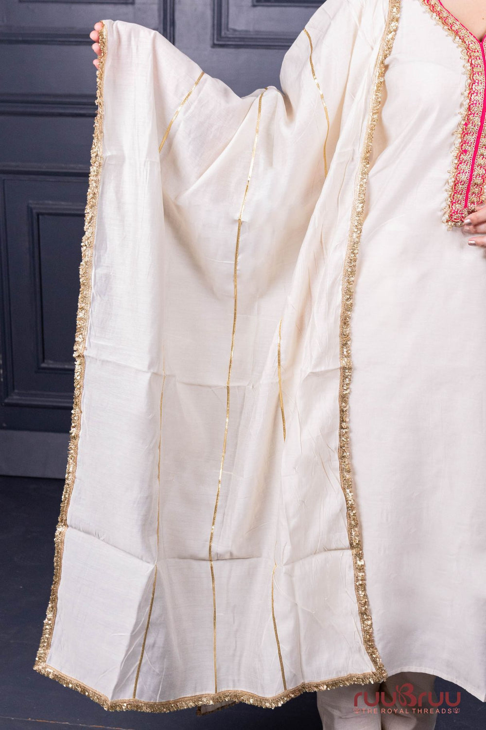 Designer Occasion Wear Viscose Silk Ladies Suit with Heavy Embroidery on Neck, Sleeves & Pockets.