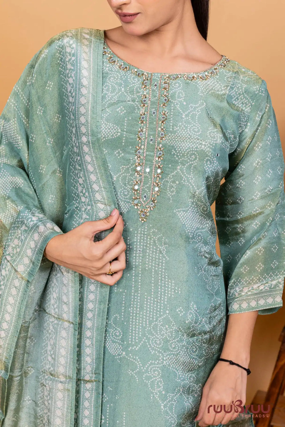 Silk Shimmer Ladies Suit with Embroidery on Neck & Digital Print.