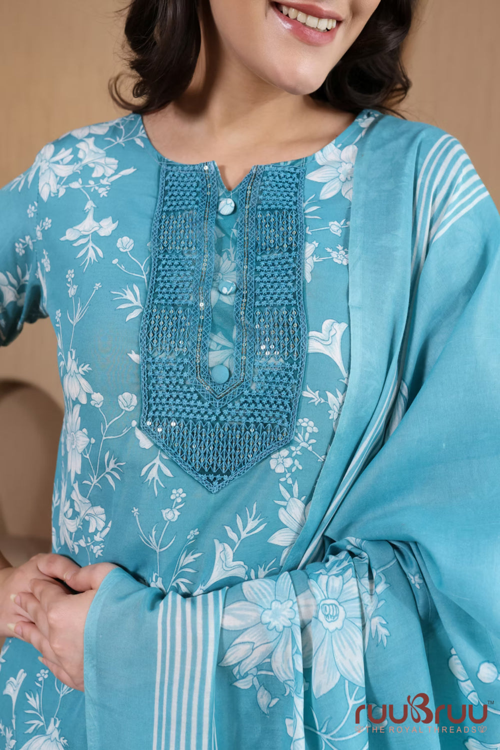 Malai Cotton 3 Pcs Suit with elegant yoke embellishment.