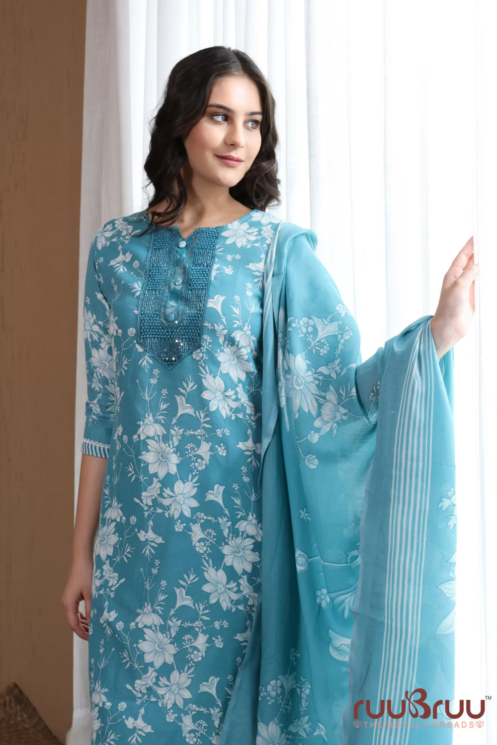 Malai Cotton 3 Pcs Suit with elegant yoke embellishment.
